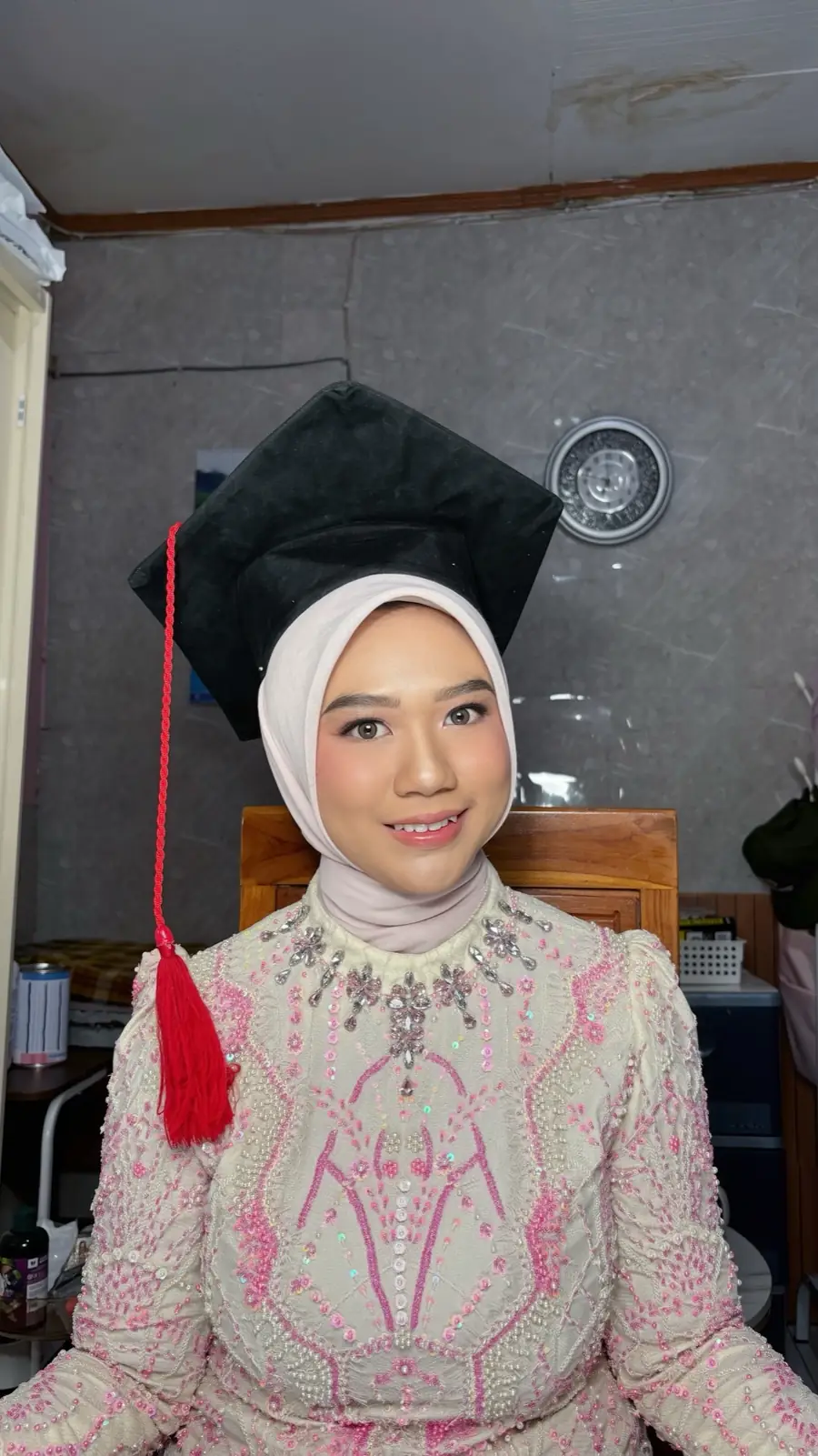 Riasan wisuda dengan toga